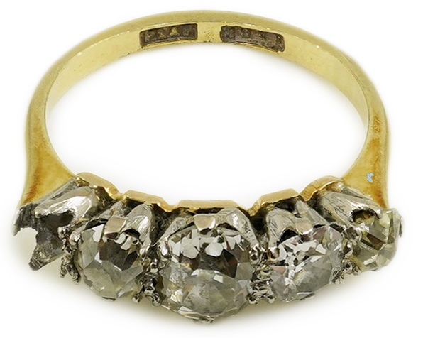 An early 20th century 18ct gold, platinum and graduated five stone old mine cut diamond set half hoop ring(one stone missing)